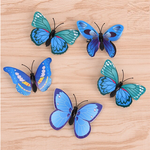 barrette papillon bleu a clipser