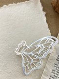 barrette papillon transparente