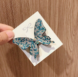 barrette papillon strass  bleu