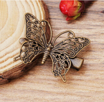 barrette papillon bronze