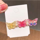 barrette papillon de plusieurs couleurs
