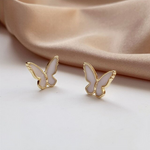 boucles d oreilles papillon blanc et or