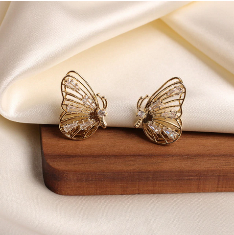 boucles d oreilles papillon en or