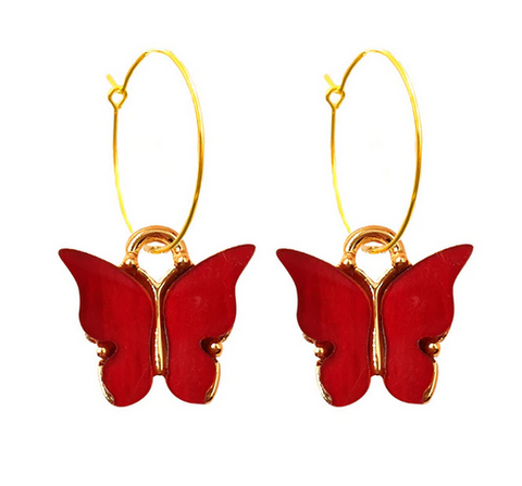 boucles d oreilles or avec papillon rouge
