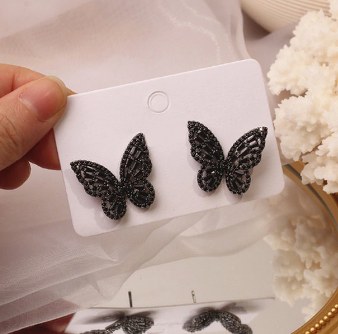 boucles d oreilles papillon cristaux noirs