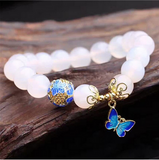bracelet papillon bleu et or
