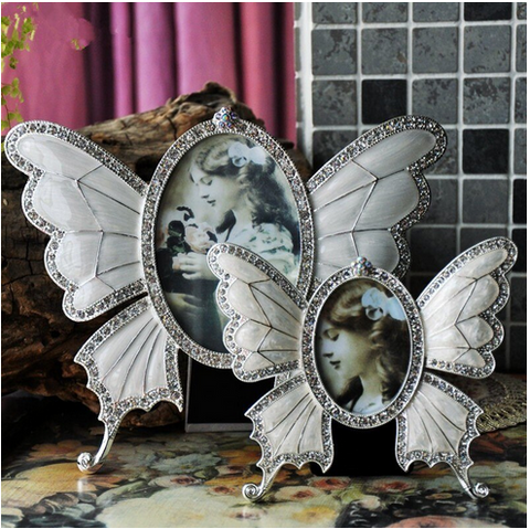 cadre photo ovale en forme de papillon