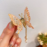 petite barrette en forme de papillon perles brillantes