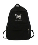 sac a dos noir avec papillon qui brille