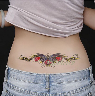 tatouage femme bas du dos papillon